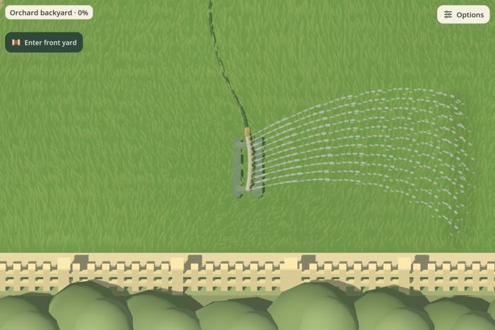 Orchard Loop's backyard sprinkler sending water over the grass.